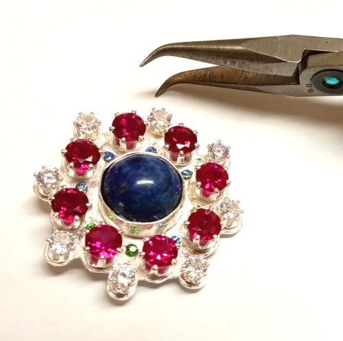 Judy Larson's CZ Explosion Necklace - , Holiday Designs, Cutting, Cutting Tool, Cutters, Filing, Finishing, How To Punch Holes, Hole Punching, Punch A Hole, Tumbling, Tumble, Tumbling Jewelry, Butane Torch, Soldering, Solder, Design, Drilling, Drill, Use bent nose pliers to tighten the snapset
